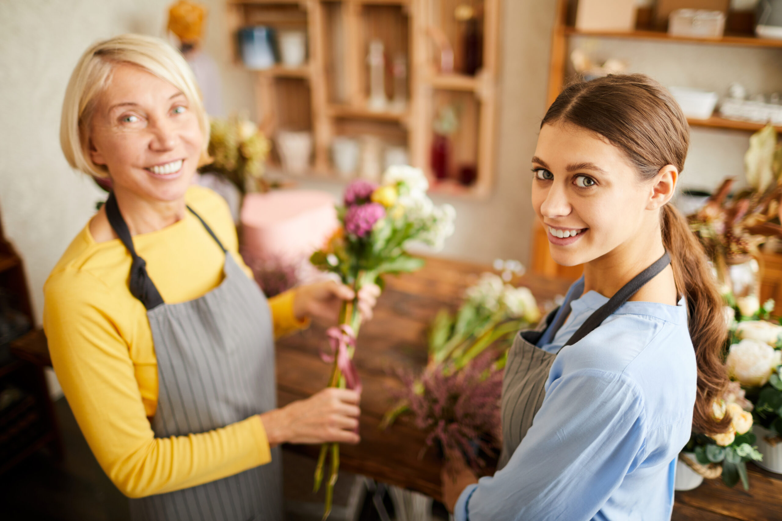 Florists Posing in Flower Shop