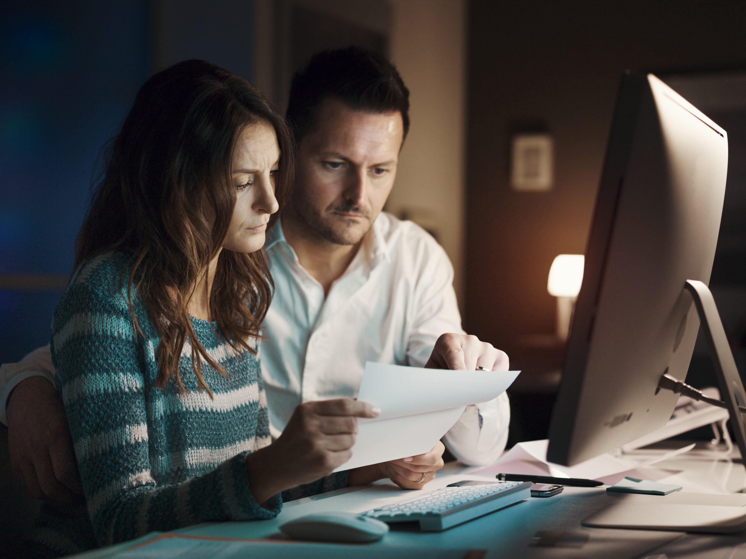 Couple checking a contract online